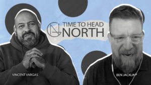 Two men, Vincent Vargas and Ben Jacklin, are pictured side by side with the text "Time to Head North" displayed between them on a blue background with black circles.