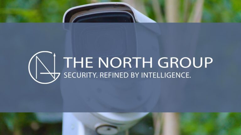 A security camera with "The North Group" logo and the tagline "Security. Refined by Intelligence." displayed over a blurred green background.