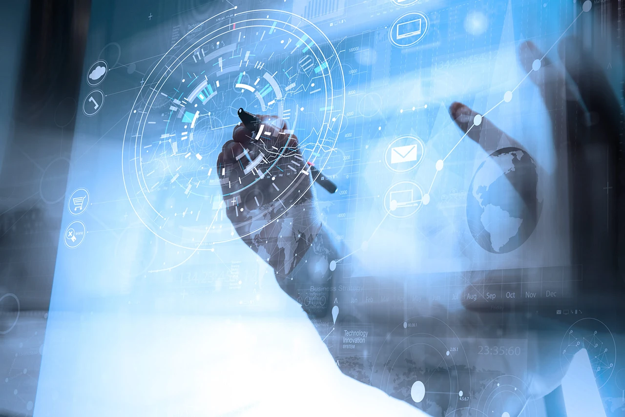 A person uses a stylus to interact with a transparent digital interface displaying futuristic data, graphs, and technology icons—highlighting advanced risk management in Healthcare & Business Security.